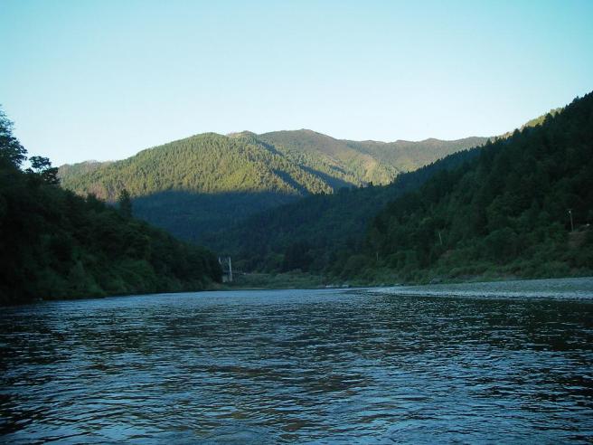 Looking upstream from halfway through the run as the sun slips behind the last hill - signaling the onset of the witching hour.