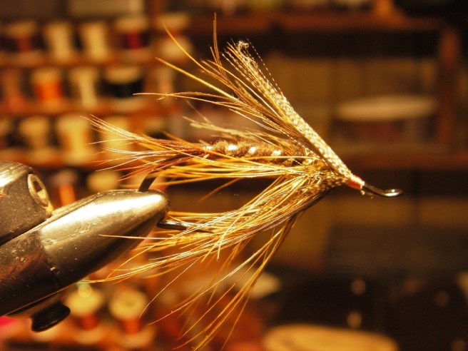 Biding time tying a few utility fles.